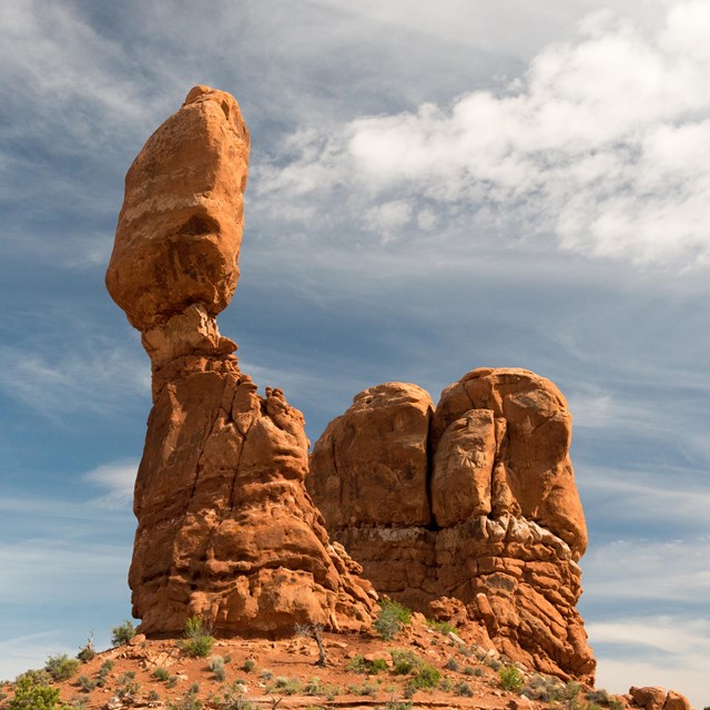 a tall, balanced rock