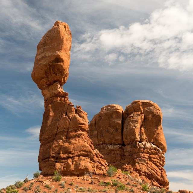 a tall, balanced rock