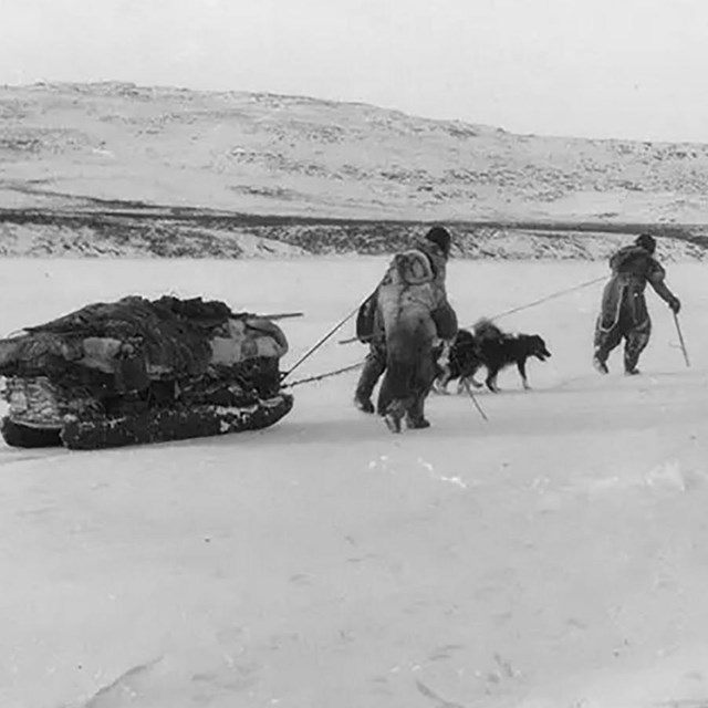 Figures on an icy landscape