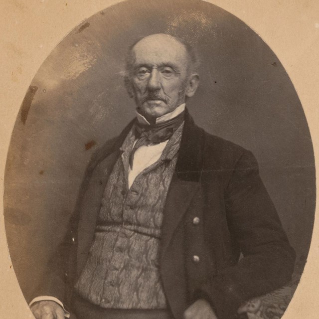 A black and white photo of George Custis
