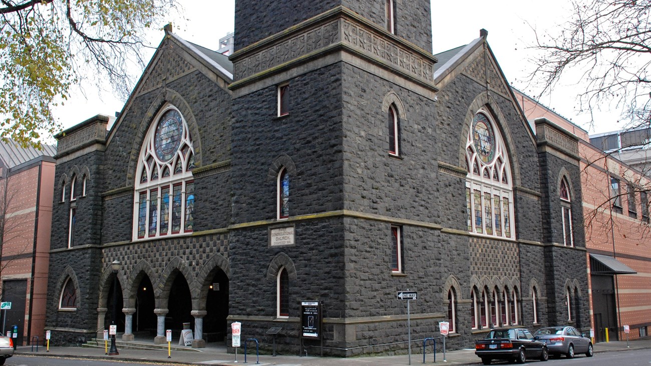 Image of the front of a stone church. Photo: by Steve Morgan , CC BY-SA 3.0