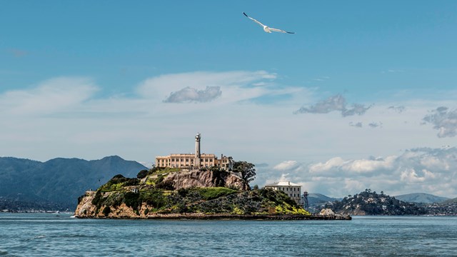 Buildings atop of a land form surrounded by 