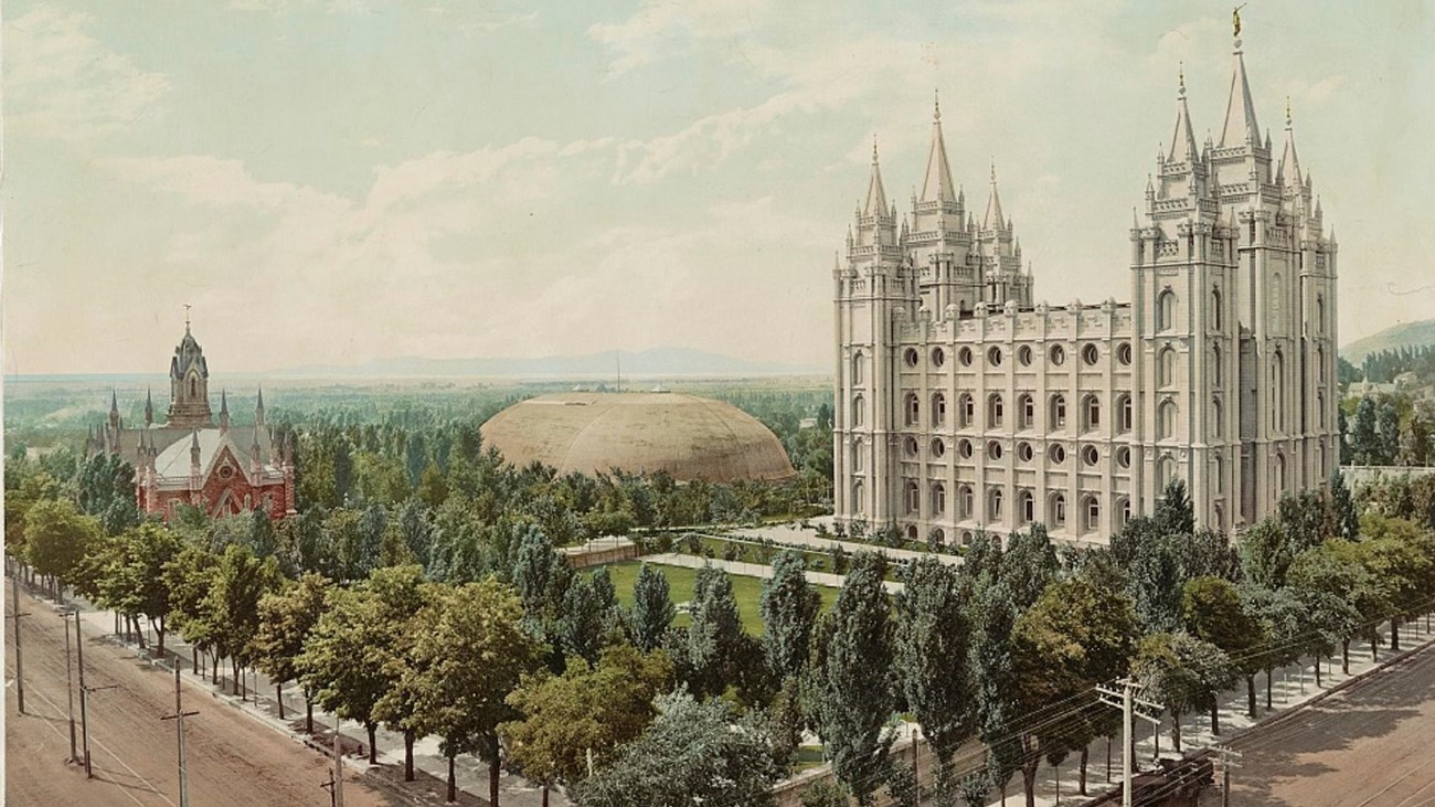 Painting of a lush green square with a large white building with spires. Library of Congress.