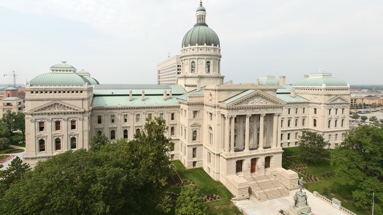 Exterior of a domed Capitol Building. 