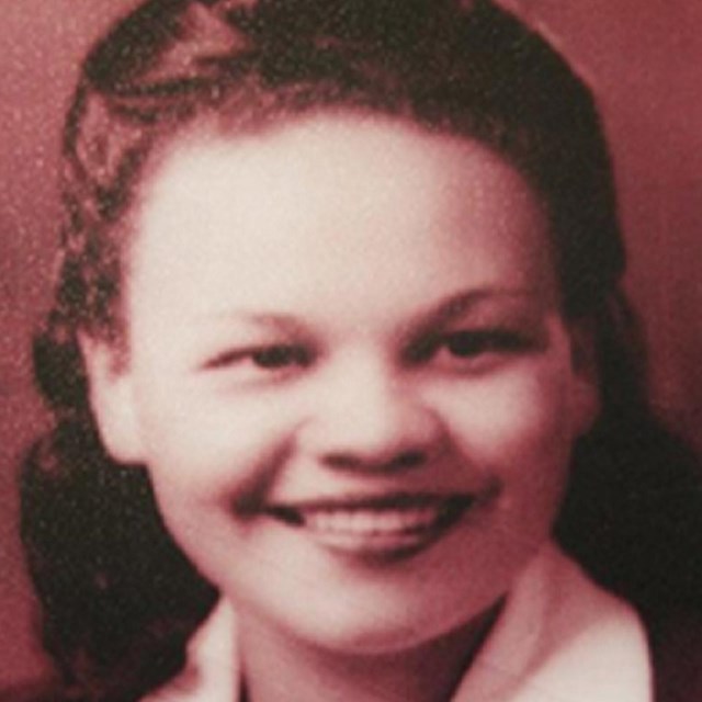 Portrait photo of a young African American woman smiling
