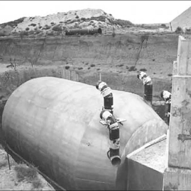 grey scale photograph of a launch control center under construction