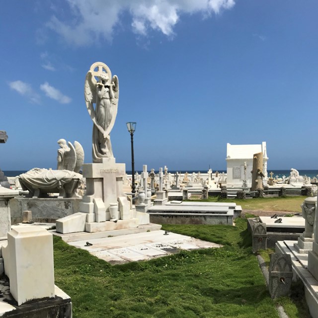 Cemetery with ornate stone tombs