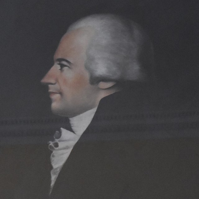 A profile portrait of Alexander Hamilton