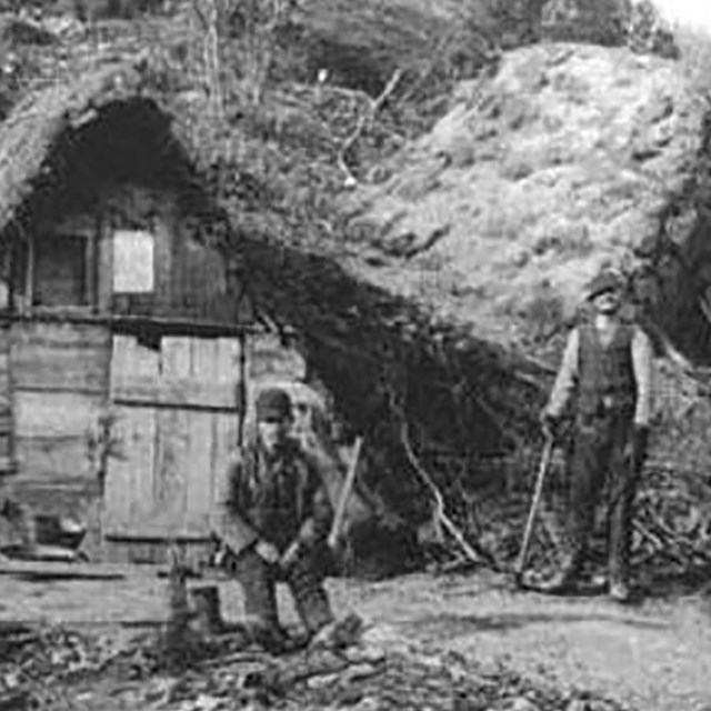 Black and white photograph of Chinese workers camps