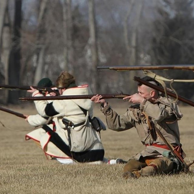 Interpreters reenact the battle at River Raisin