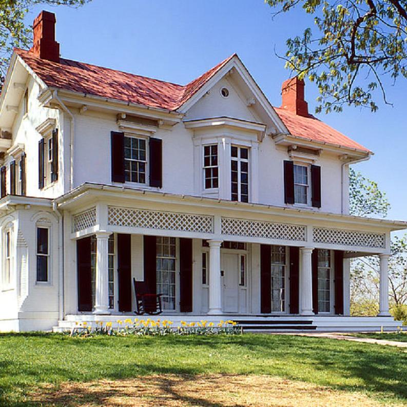 photo of a house on a hill. 