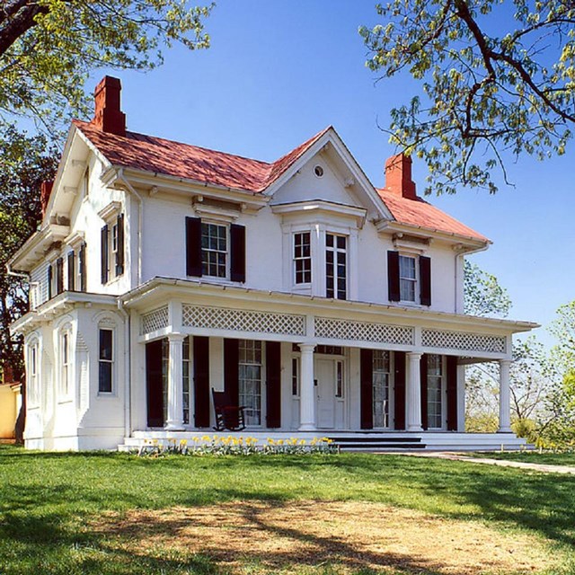 photo of a house on a hill. 