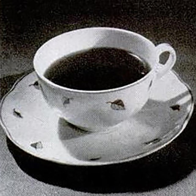 Coffee cups showing a regular serving and a reduced wartime serving