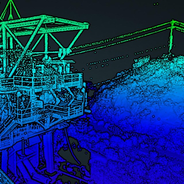 Pointcloud rendering of rocket stand shaded from blue to green