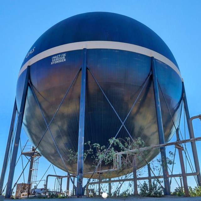 Photo of large spherical tank on metal legs