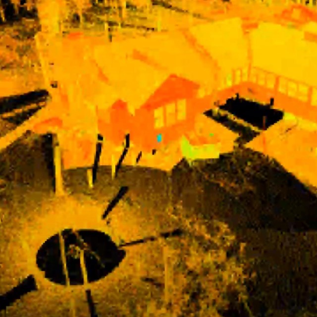 3D render in orange tones of cabin in woods