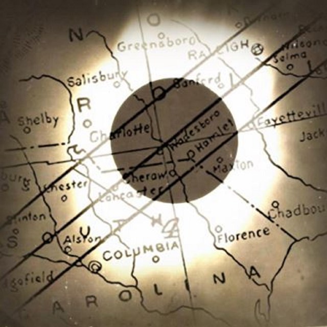 Image of ellipse shadow over a map. 