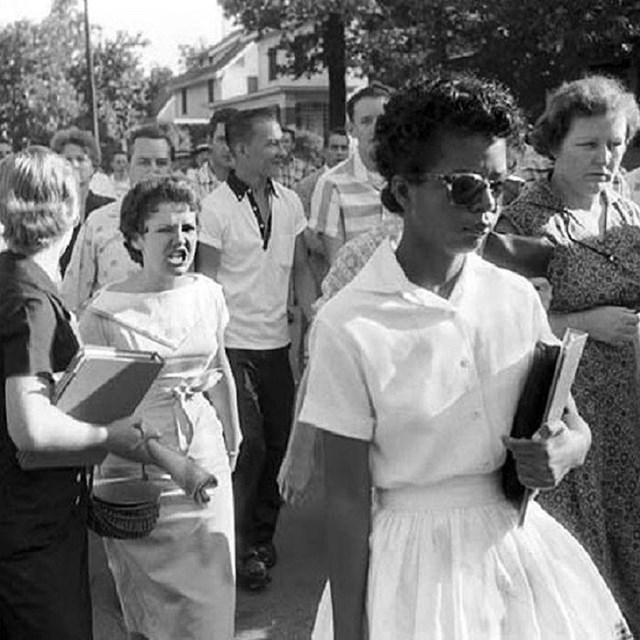 Woman being harassed. (Photo by and courtesy of Will Counts and the Arkansas Democrat-Gazette)