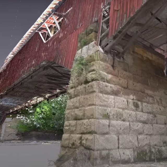 3D render of covered bridge and stone support