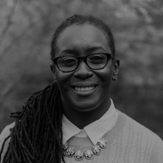 A woman smiling in a headshot