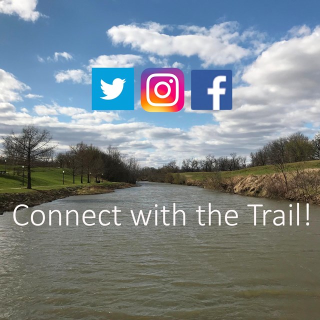 An image of a flat river with flat banks, with the social media logos.