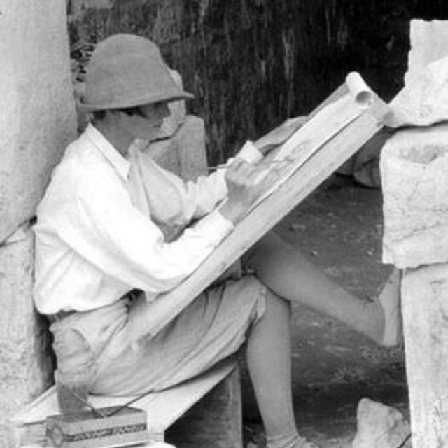 Woman drawing at an easel