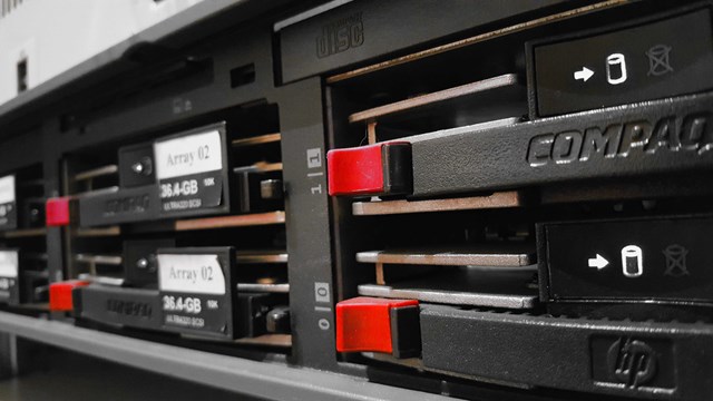 A wall server with red tabs sticking out on the front