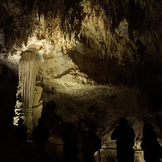 a dimly lit image of a cave