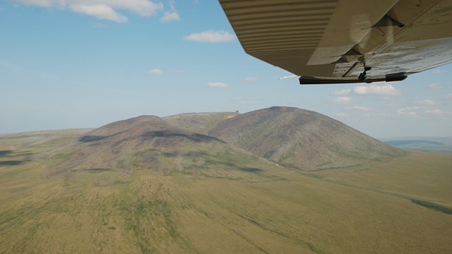 Aerial view of green hills. 