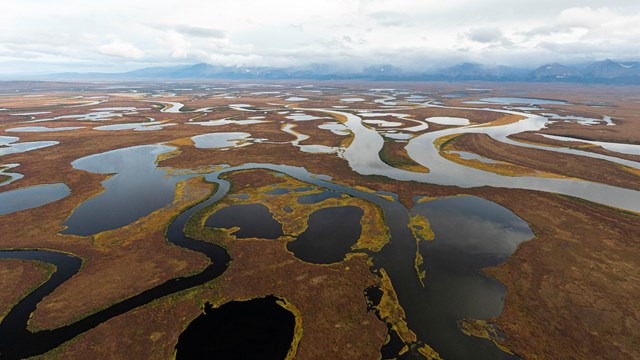 From above, we see a mosaic of lakes, rivers, and tundra