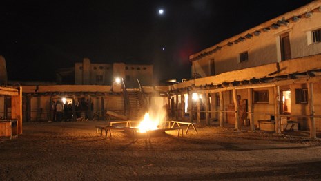 Fires light up the plaza at Bent's Old fort