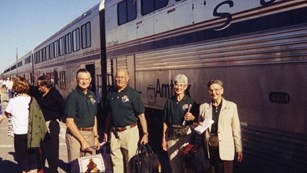 Trails and Rails volunteers wait to board the Southwest Chief train