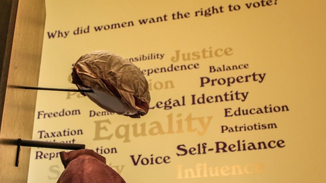 Word cloud in Belmont-Paul museum answering the question "Why did women want the right to vote?"