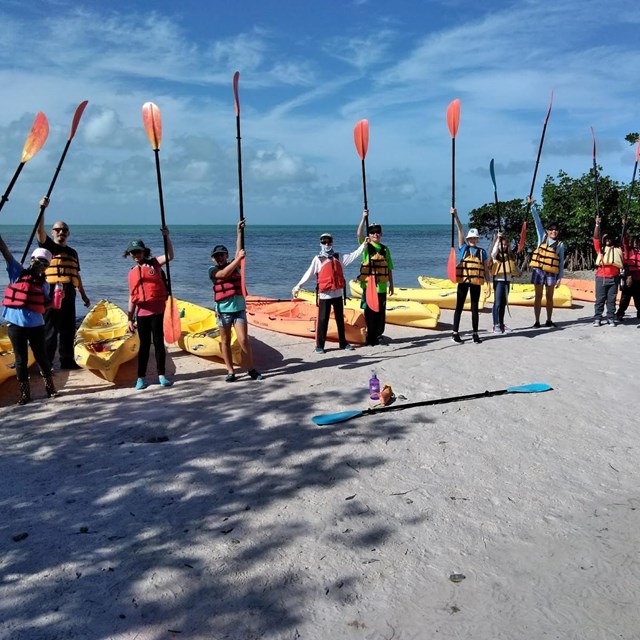 Students preparing to launch kayaks