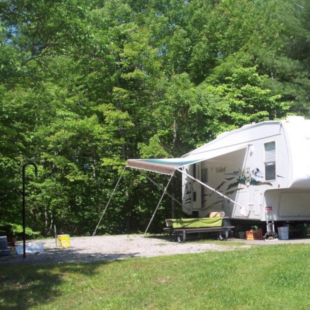 campsite with trailer parked on site