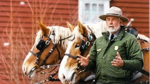 Image of Ranger Chuck with two horses