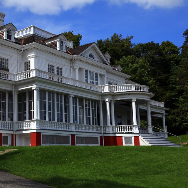 A close-up of Flat Top Manor, a historic country estate in the mountains.