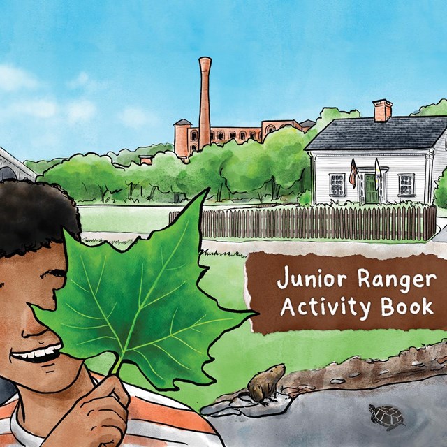 Junior Ranger activity board with pages in pockets