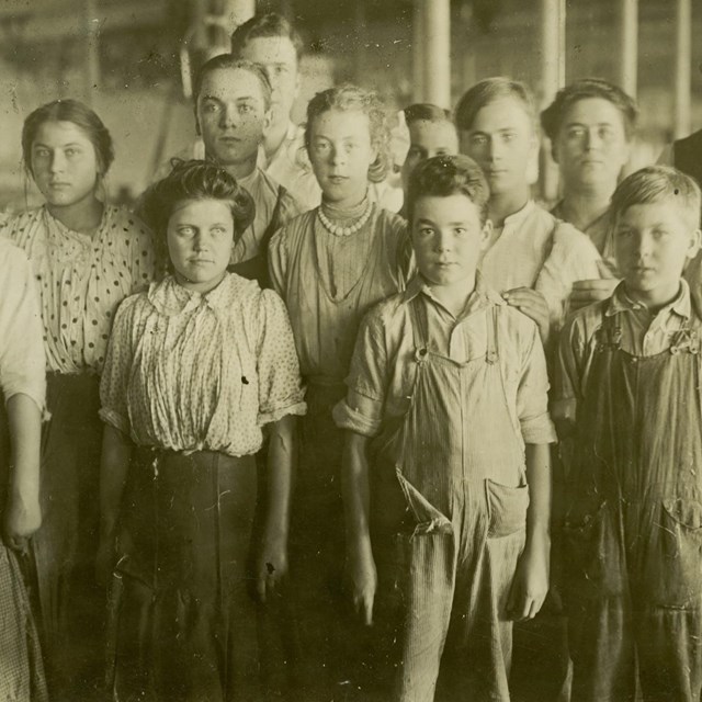 Group of child laborers posing for a picture