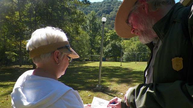 ranger assisting a visitor