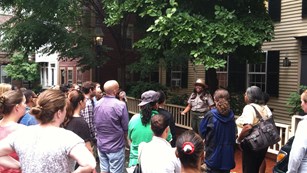 Ranger and group inside the African Meeting House