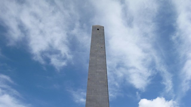 Bunker Hill Monument on a clear, blue day.