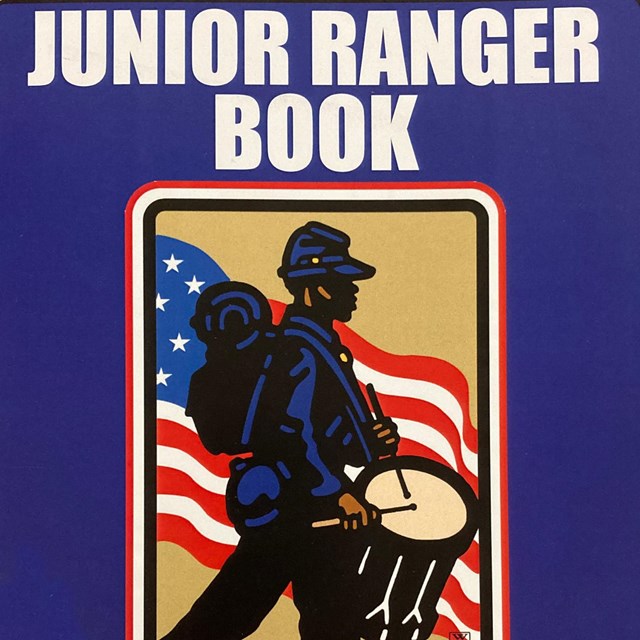 Cover of Jr. Ranger Book of a Black Civil War Soldier marching and beating a drum.