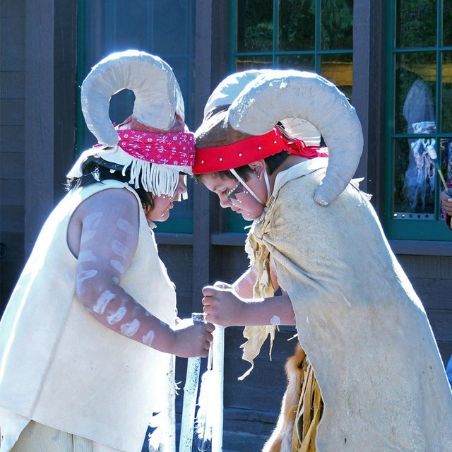 Two members of the Paiute tribe perform a dance 