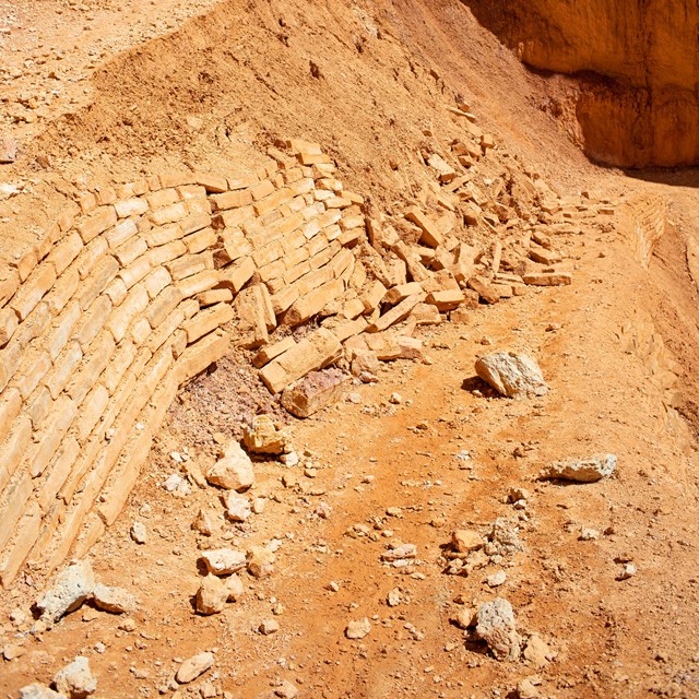 A large rock wall collapsed.