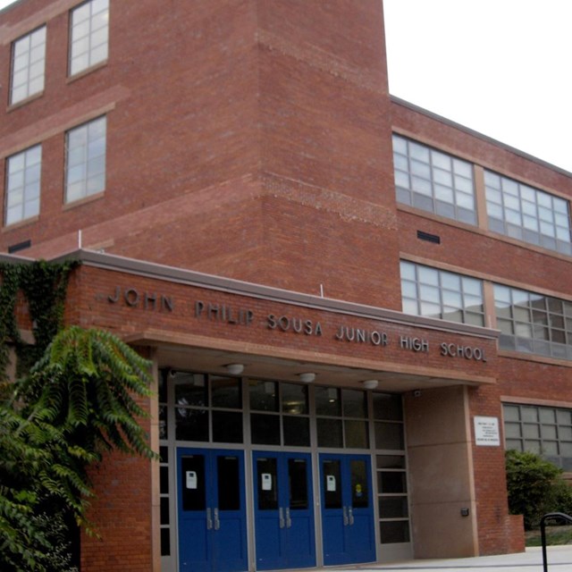 The superior, modern brick building for John Phillip Sousa Junior High School