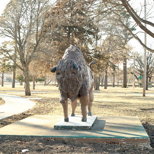 statue of a buffalo in cushinberry park, Topeka, KS.
