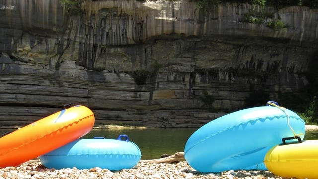 Colorful inner tubes on the gravel bar at Buffalo Point