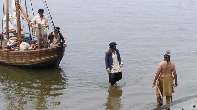 Living Historians recreate an encounter between Smith and American Indians.