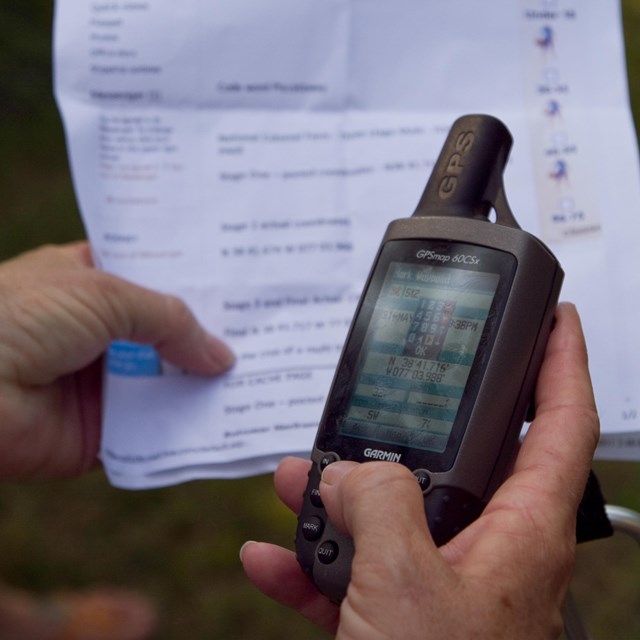 GPS device and chart used for geocaching. 